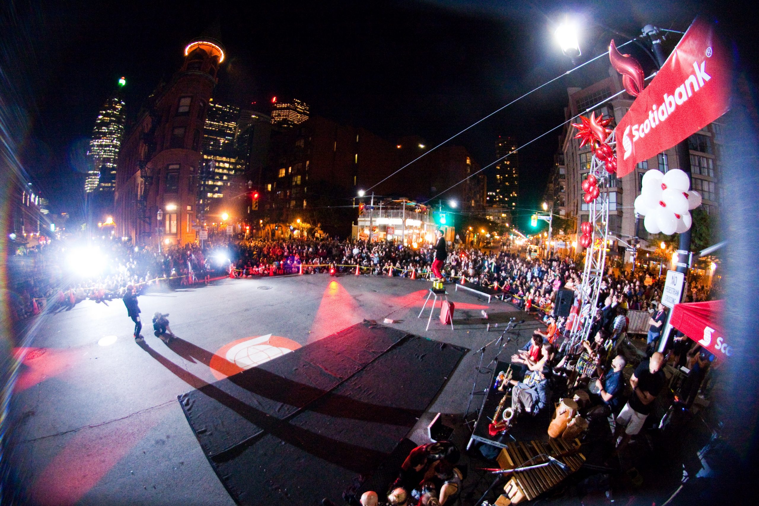 FireGuy performing on an outdoor stage for what looks to be a fundraiser in New York.