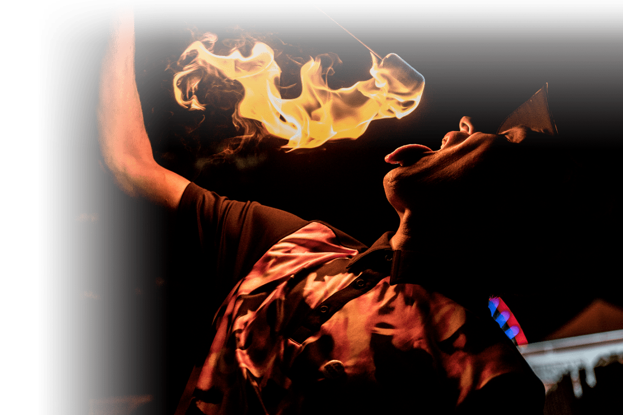 Fading image of FireGuy swallowing fire.