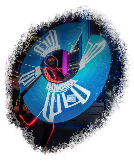 GlowGuy dancing with an LED spinner creating an imact saying 'Toronto' on it while performing in Toronto itself.
