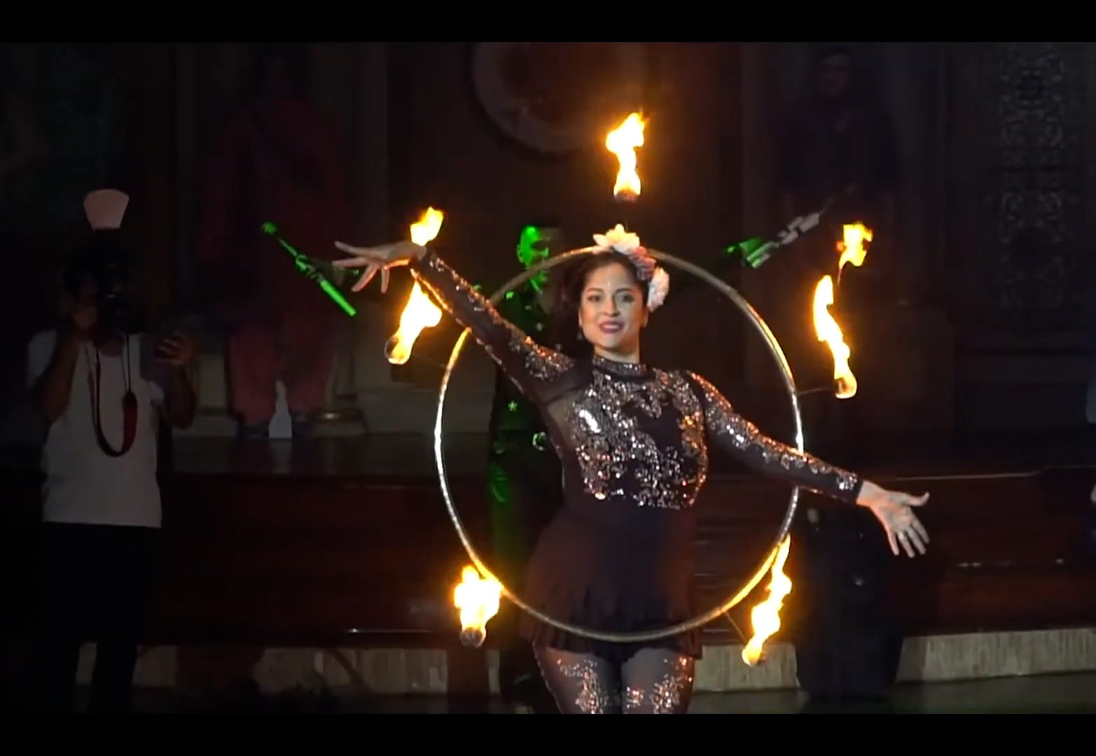 FireGuy doing a fire dance show with his wife.