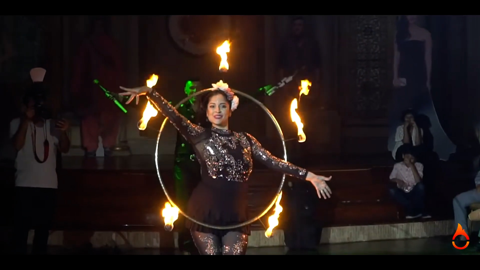 FireGuy doing a fire dance show with his wife.